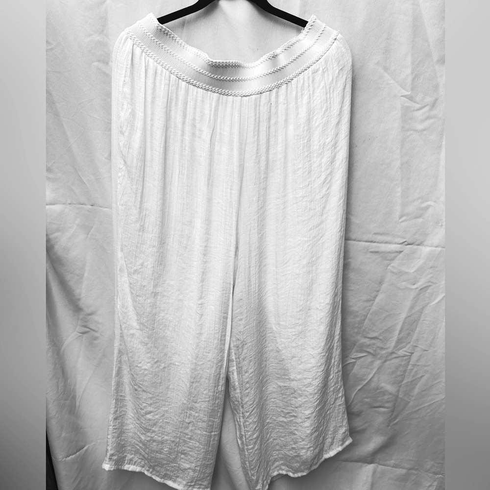 White Flowy Pants. Lined with elastic wide waste band for comfort.